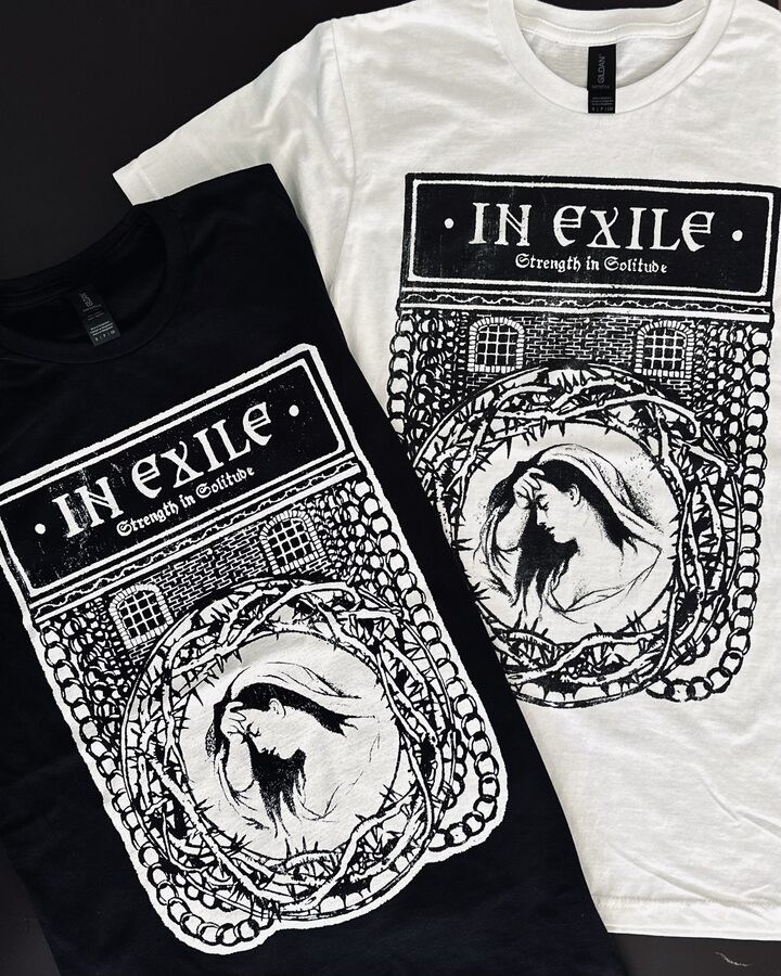 Two screen-printed tees carrying a hand-drawn In Exile block print
