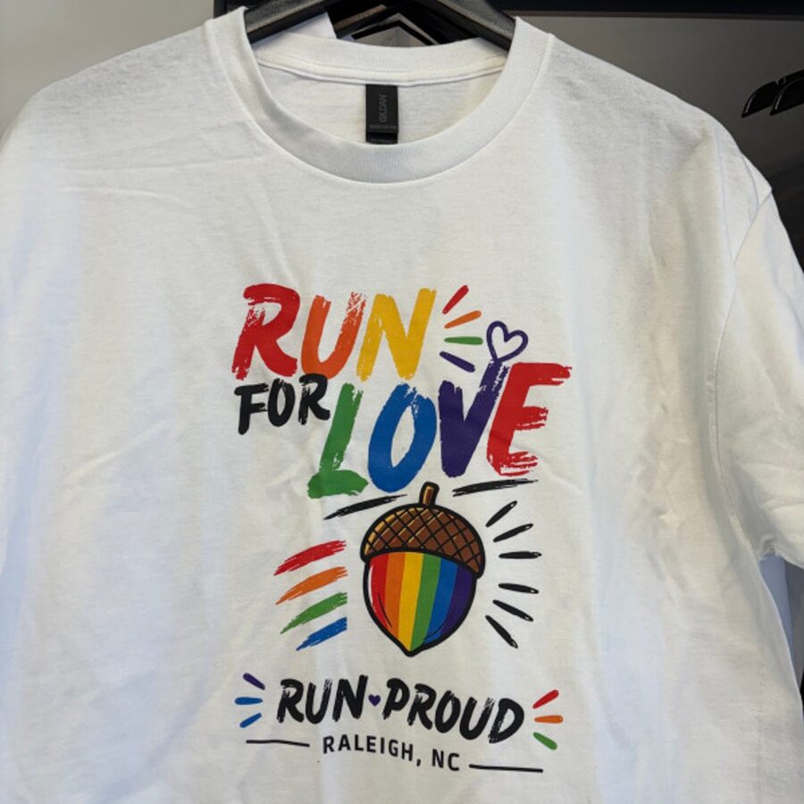 The Run For Love 5K tee with a rainbow acorn, reading Run Proud Raleigh NC