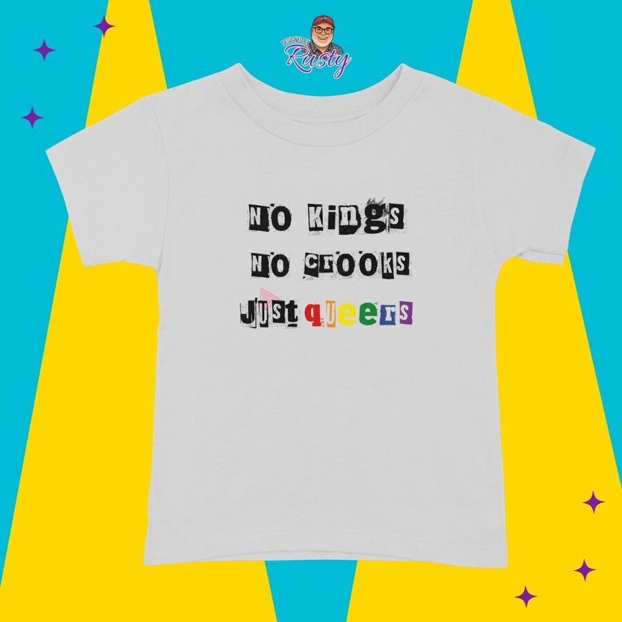 White tee reading No Kings No Crooks Just Queers in ransom-note lettering