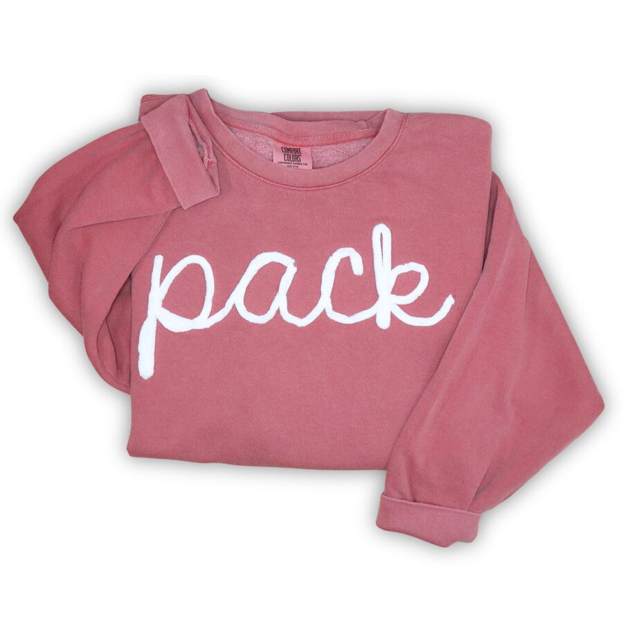 Crimson crewneck with raised white chenille yarn embroidery